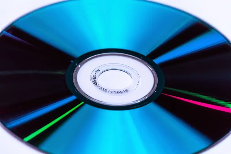 Vivid close-up image showing reflections on a colorful CD disc